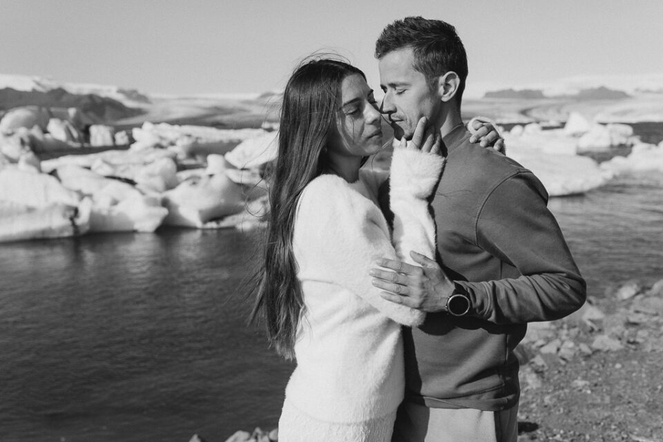 intimate couple photoshoot with icebergs in the background