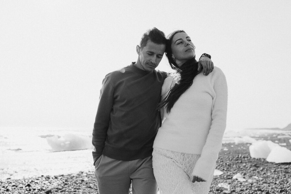 beautiful elopement couple walking at diamond beach Iceland