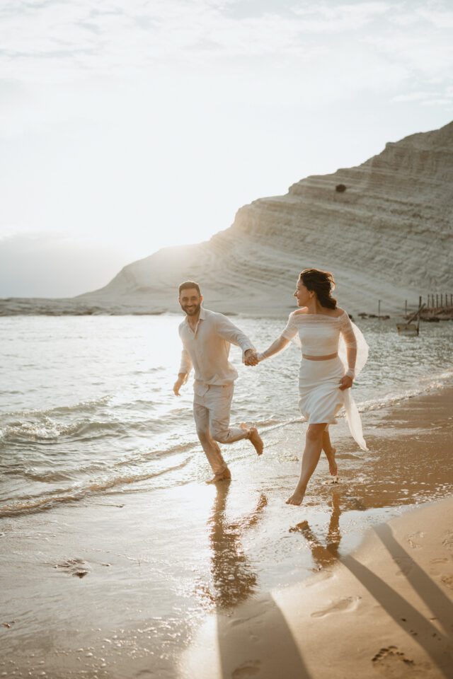 Sunset couple portrait on Sicily coastline