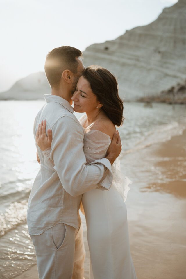 Close embrace during after wedding photoshoot in Sicily