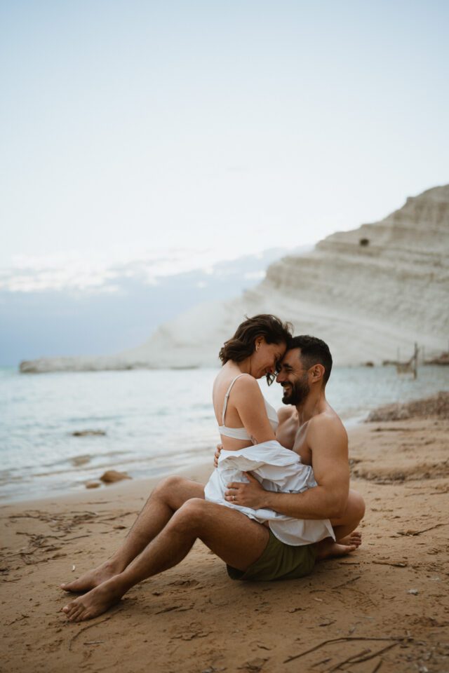 Romantic walk along the beach during after wedding session