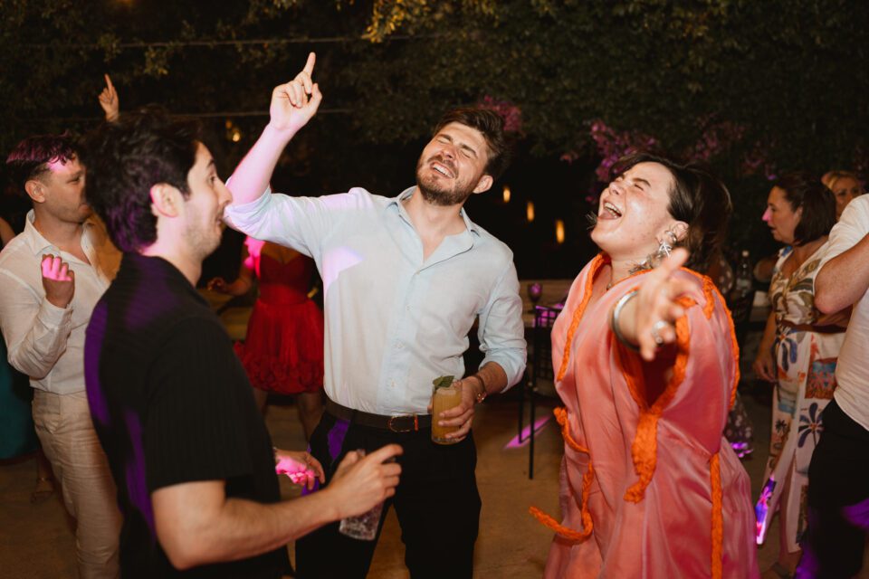 Guests dancing during wedding party at Alistos Hotel Greece