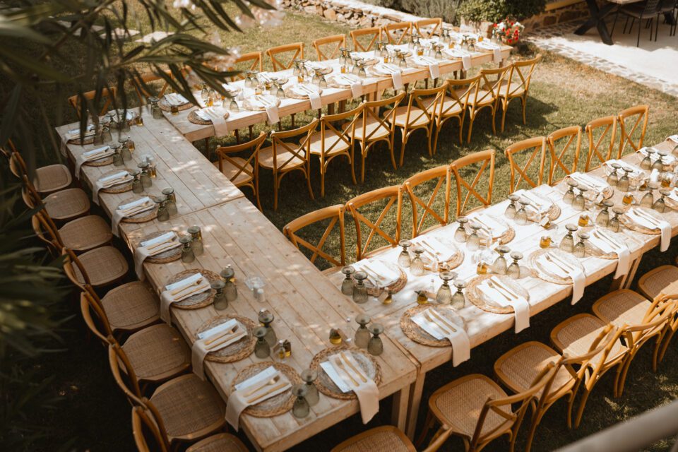 Wedding reception table setup at hilltop venue in Greece
