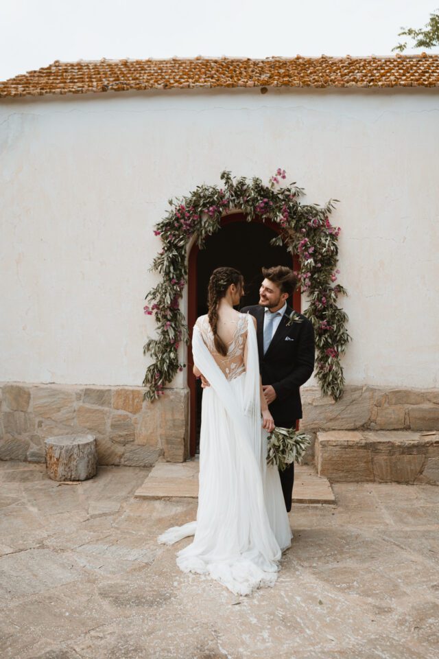 bride and groom portrait after ceremony in Greece landscape