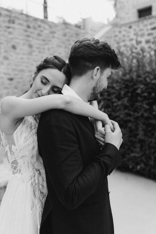 Intimate embrace at destination wedding near Athens