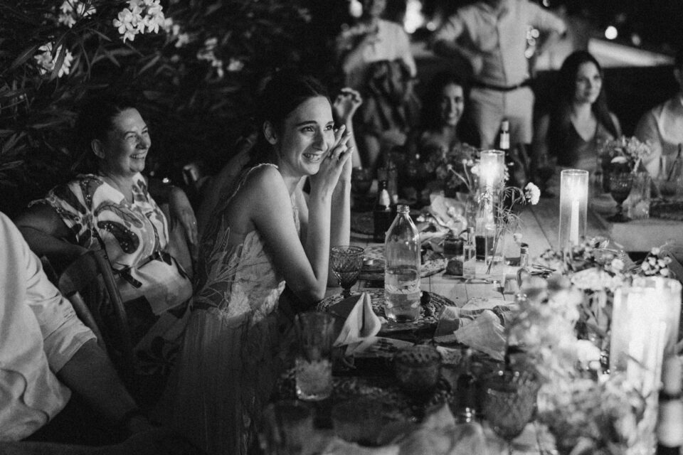 Black and white moment during wedding dinner celebration