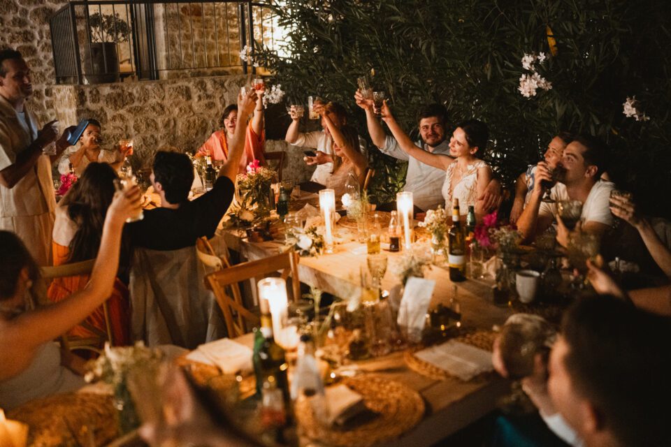 Guests applauding during wedding speeches